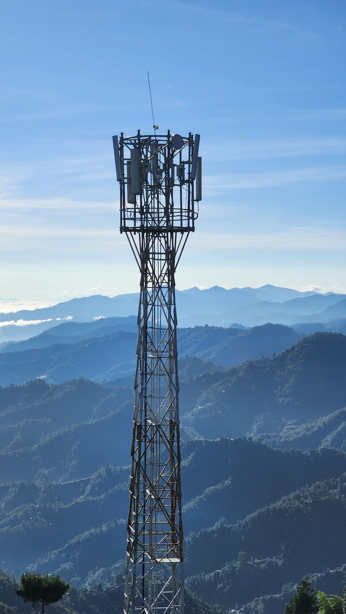 Telecom tower on a remote mountain site serving wide rural coverage